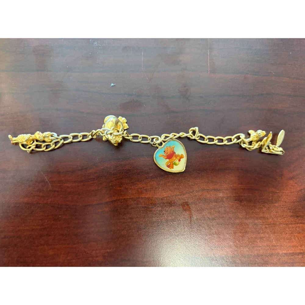 Vintage Disney Winnie The Pooh, gold-tone charm bracelet